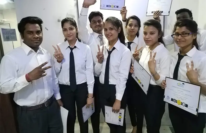 Students holding certificates after course completion at Oxford School of Accounting