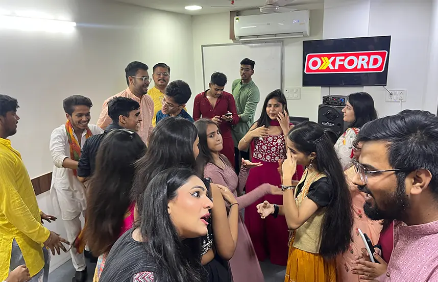 Oxford School of Accounting students celebrating Dandiya Night with traditional wear and joyful dance