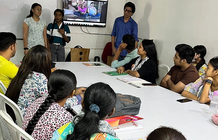 Students performing a roleplay activity at Oxford School of Accounting