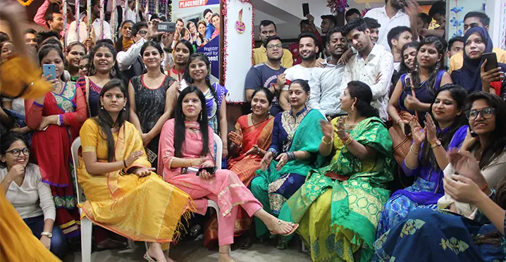 Students celebrating Diwali in colourful traditional attire.